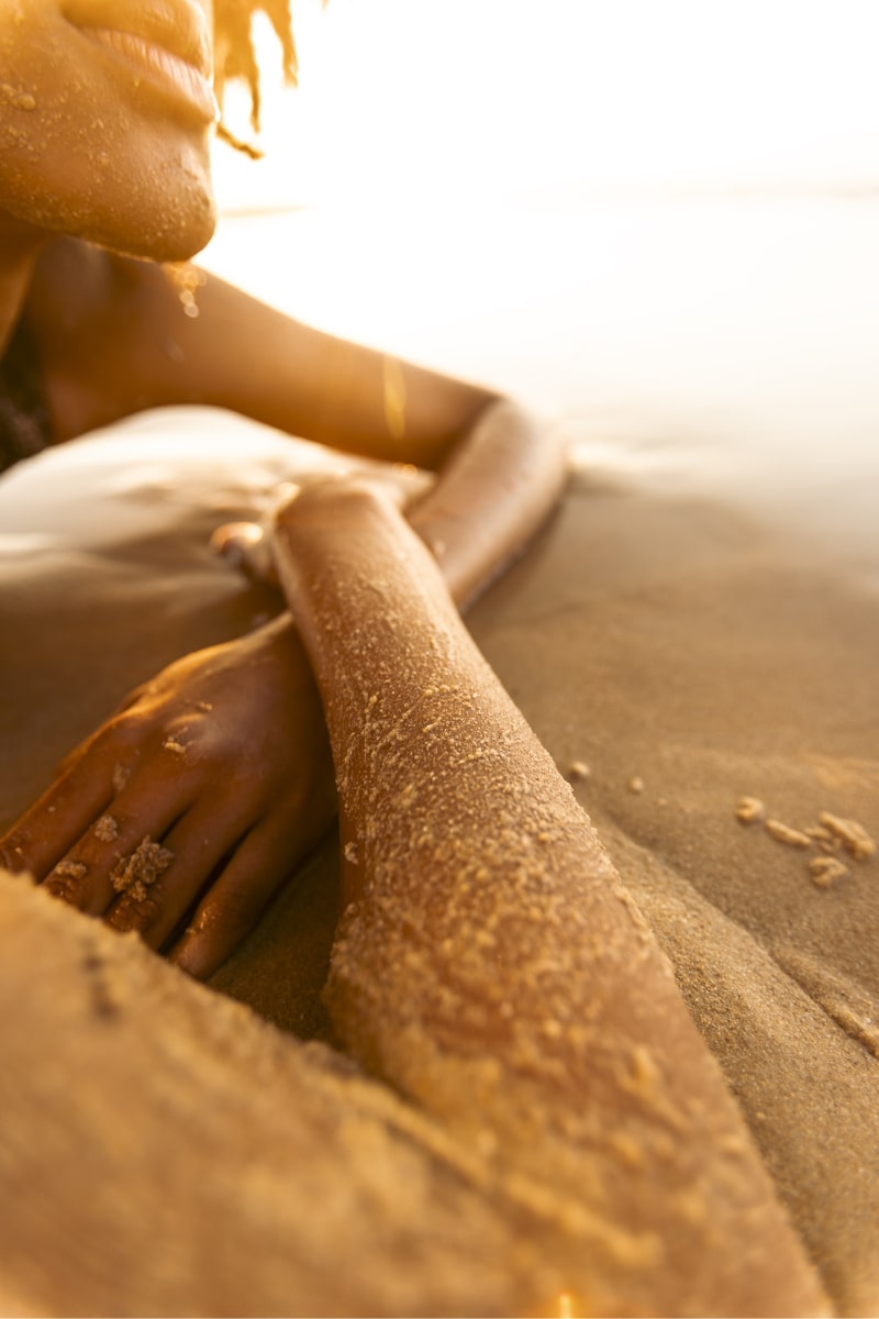 Girl laid down at the Vilamoura's beautiful beache