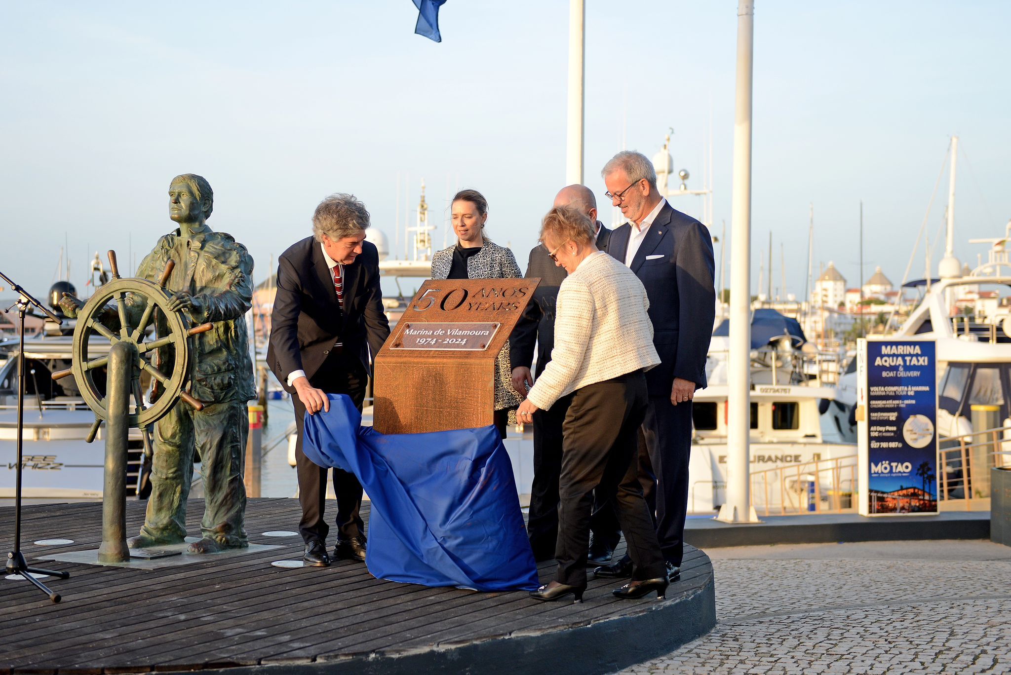 Plaque commemorating the 50th anniversary of Marina de Vilamoura, celebrating its legacy and the launch of the Nova Marina.